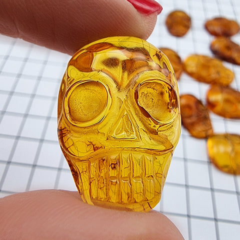 Cognac Amber Carved Skull Cabochons