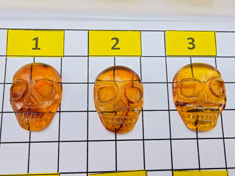 Cognac Amber Carved Skull Cabochons