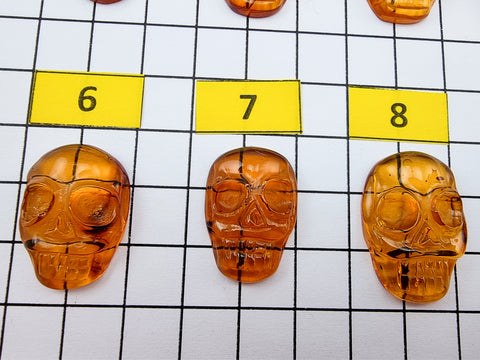 Cognac Amber Carved Skull Cabochons