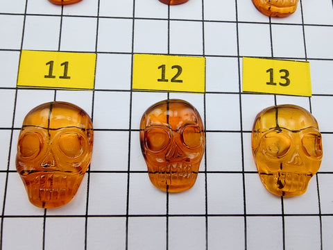 Cognac Amber Carved Skull Cabochons