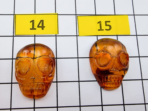 Cognac Amber Carved Skull Cabochons