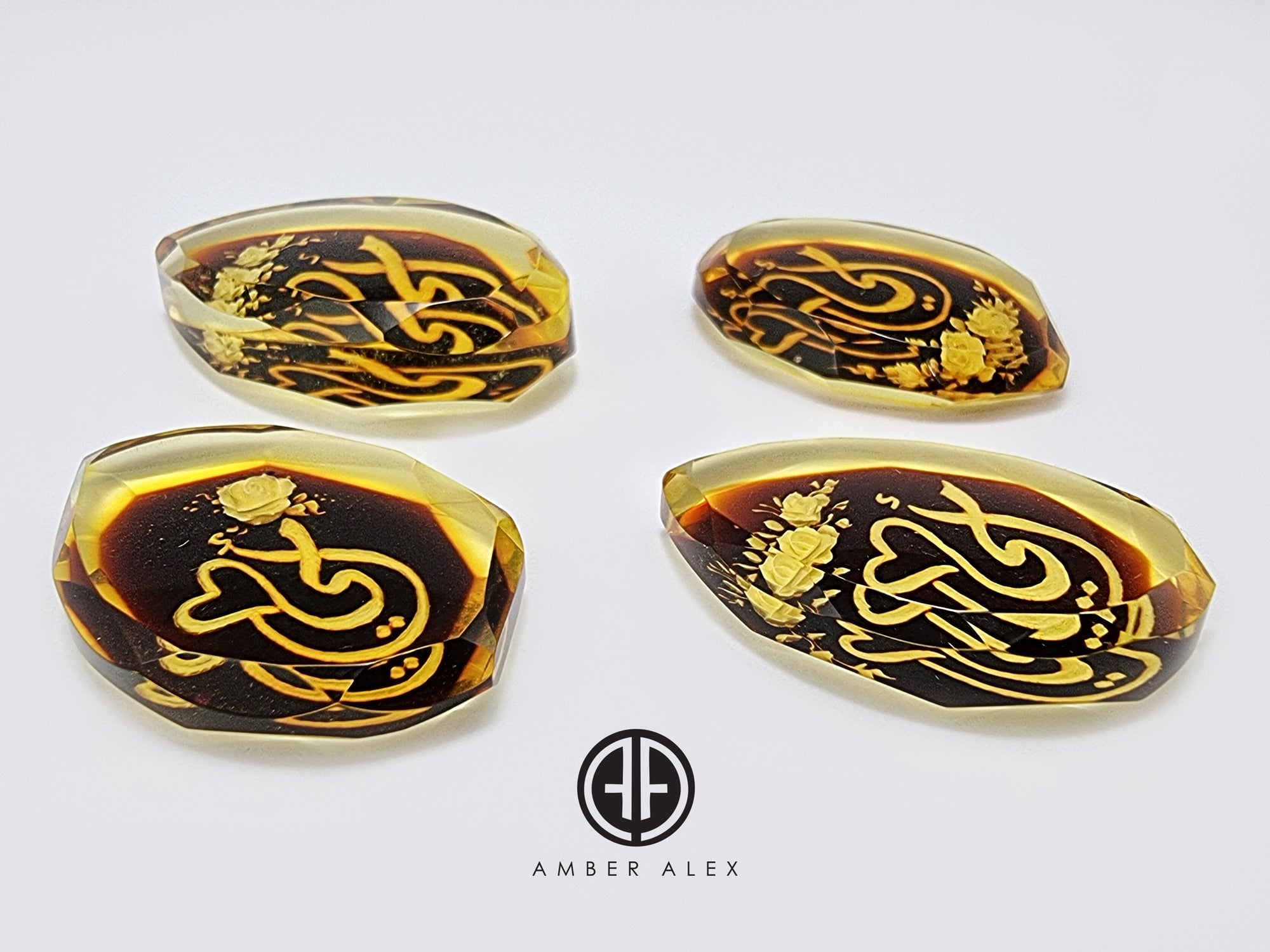 Two Tone Amber Engraved 'Mother' in Arabic Faceted Oval Shape Cabochons