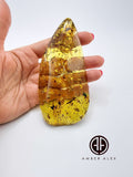 Green Amber Wave Shape Stone With Insects
