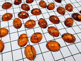 Cognac Amber Calibrated Faceted Oval Cabochons