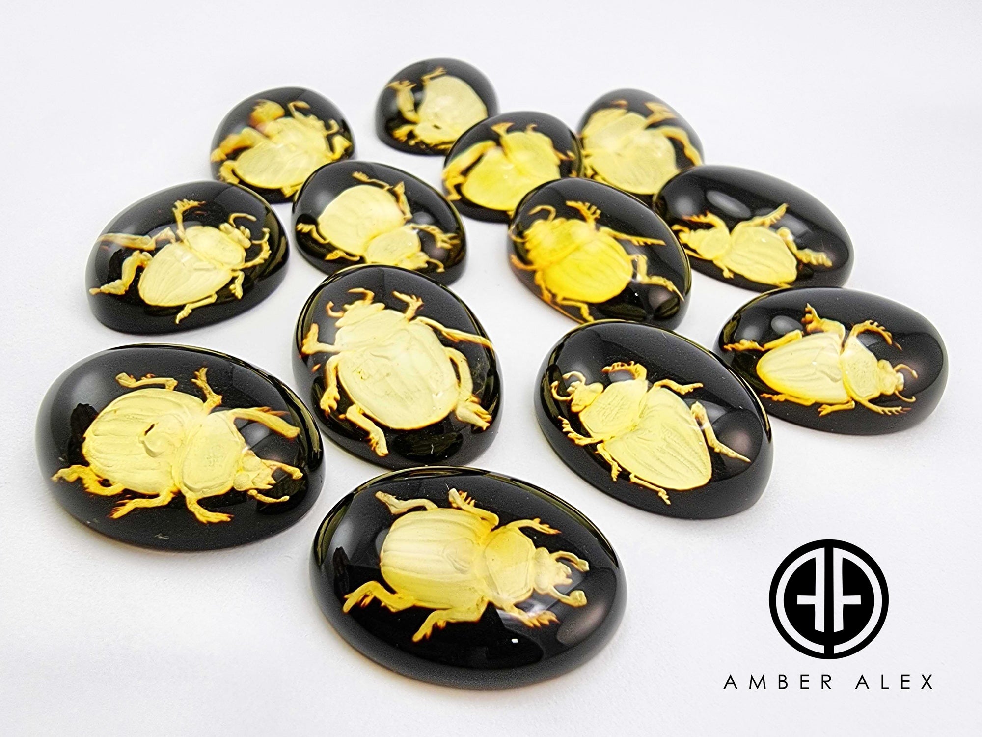 Cherry Amber Engraved Scarab Oval Shape Cabochons