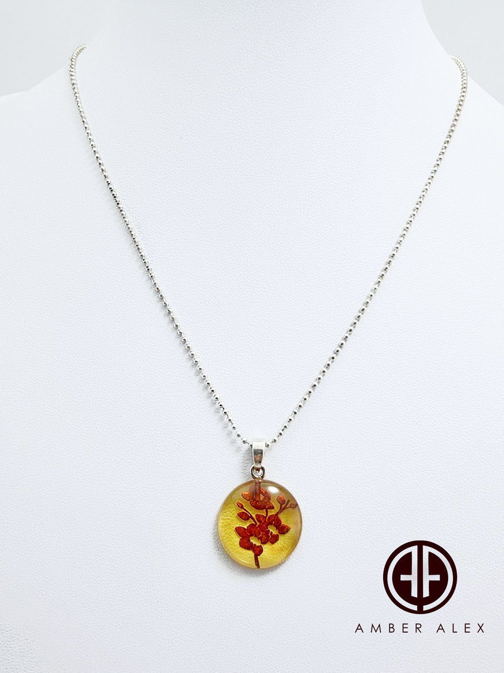 Cognac Amber Engraved Orchids Round Pendant Sterling Silver