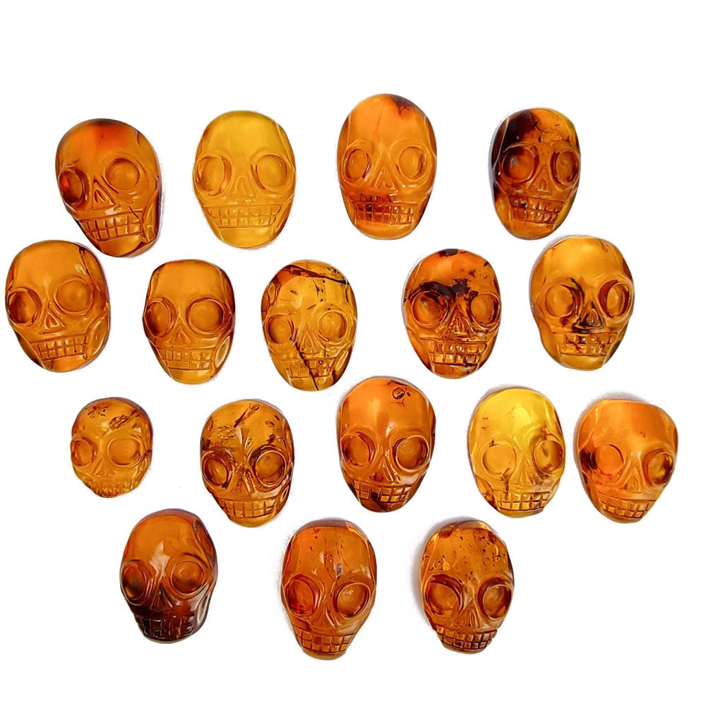 Cognac Amber Carved Skull Cabochons