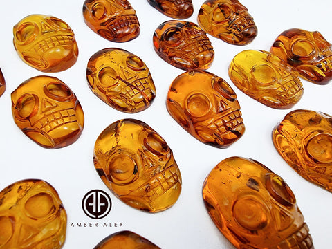 Cognac Amber Carved Skull Cabochons