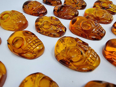 Cognac Amber Carved Skull Cabochons