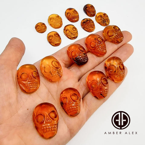 Cognac Amber Carved Skull Cabochons