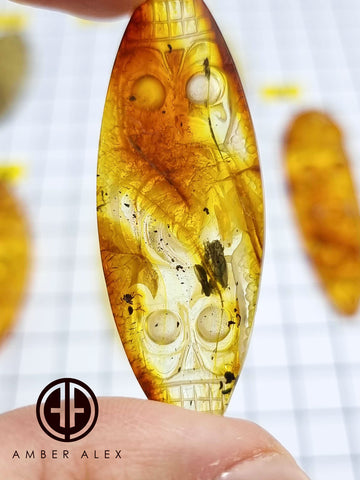 Cognac & Fossil Amber Carved Roses And Skull Cabochons