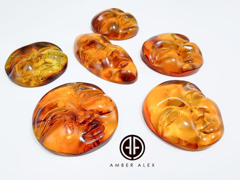 Cognac Amber Carved Faces Cabochons