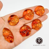 Cognac Amber Carved Faces Cabochons