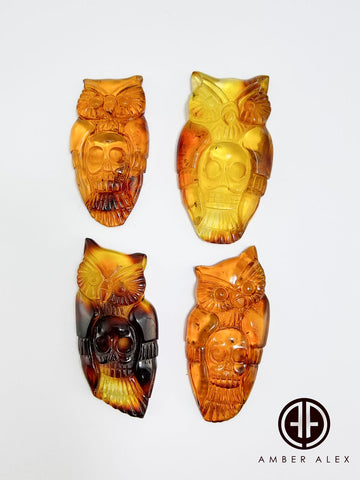 Cognac Amber Carved Owl with Skull Cabochons