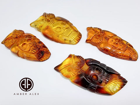 Cognac Amber Carved Owl with Skull Cabochons