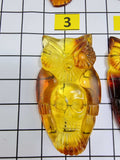 Cognac Amber Carved Owl with Skull Cabochons