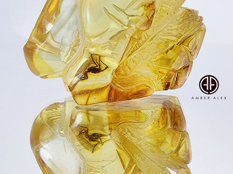 Natural Amber Carved Dinosaur Figurine With Insects