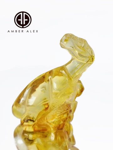 Natural Amber Carved Dinosaur Figurine With Insects