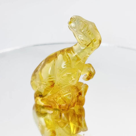 Natural Amber Carved Dinosaur Figurine With Insects