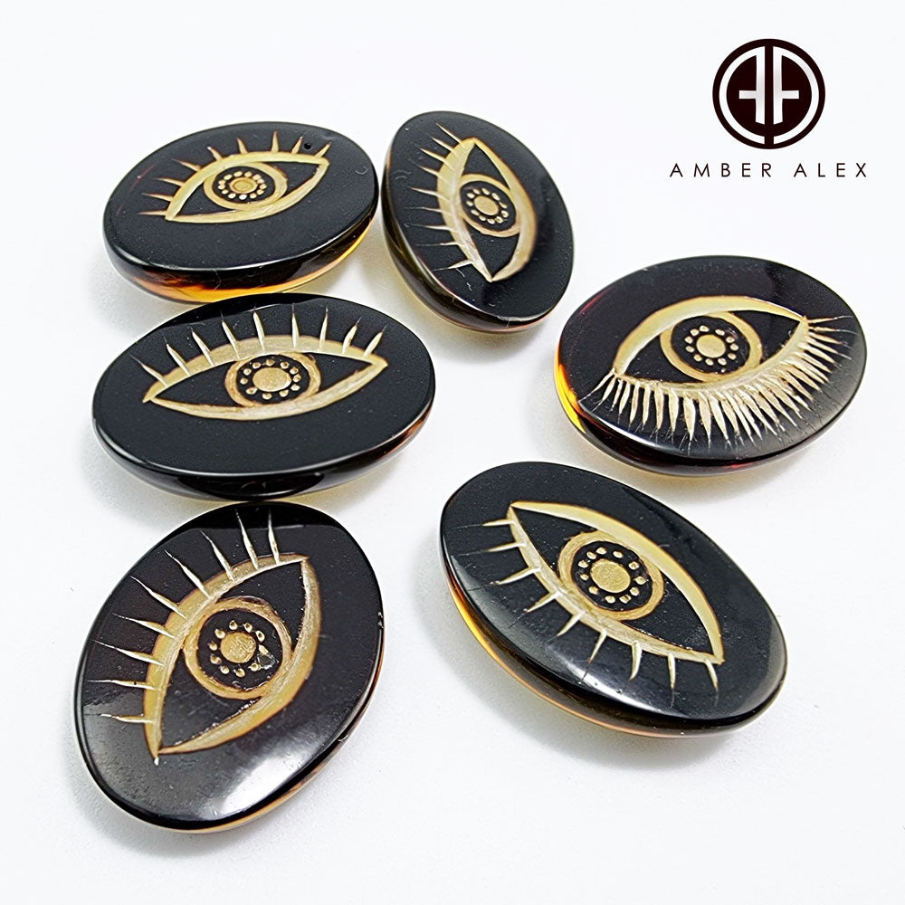 Cherry Amber Engraved Eyes Oval Shape Cabochon