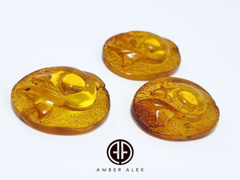 Cognac Amber Carved Fish Cabochon