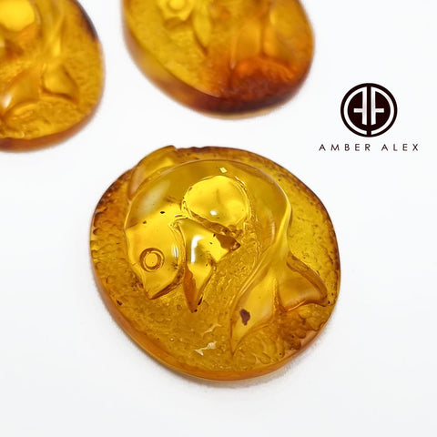 Cognac Amber Carved Fish Cabochon