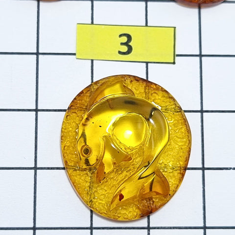 Cognac Amber Carved Fish Cabochon