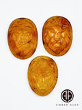 Cognac Amber Carved Lion Cabochon