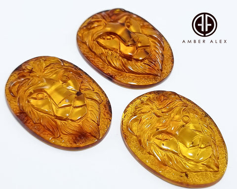 Cognac Amber Carved Lion Cabochon