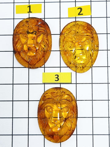 Cognac Amber Carved Lion Cabochon