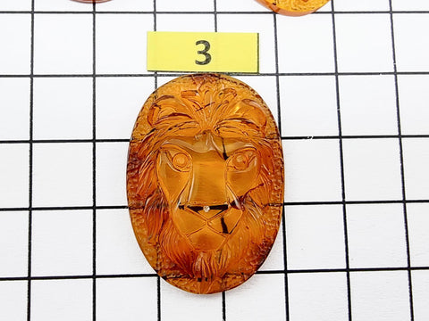 Cognac Amber Carved Lion Cabochon