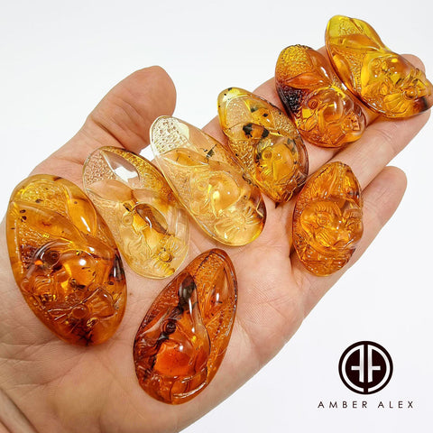 Fossil & Cognac Amber Carved Rabbits Cabochons