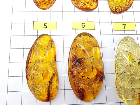 Fossil & Cognac Amber Carved Rabbits Cabochons