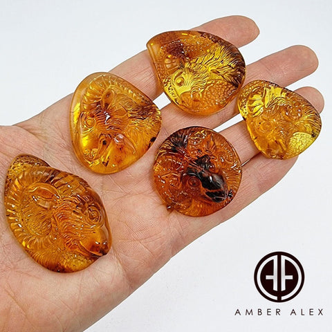 Cognac Amber Carved Aries & Goat Cabochons