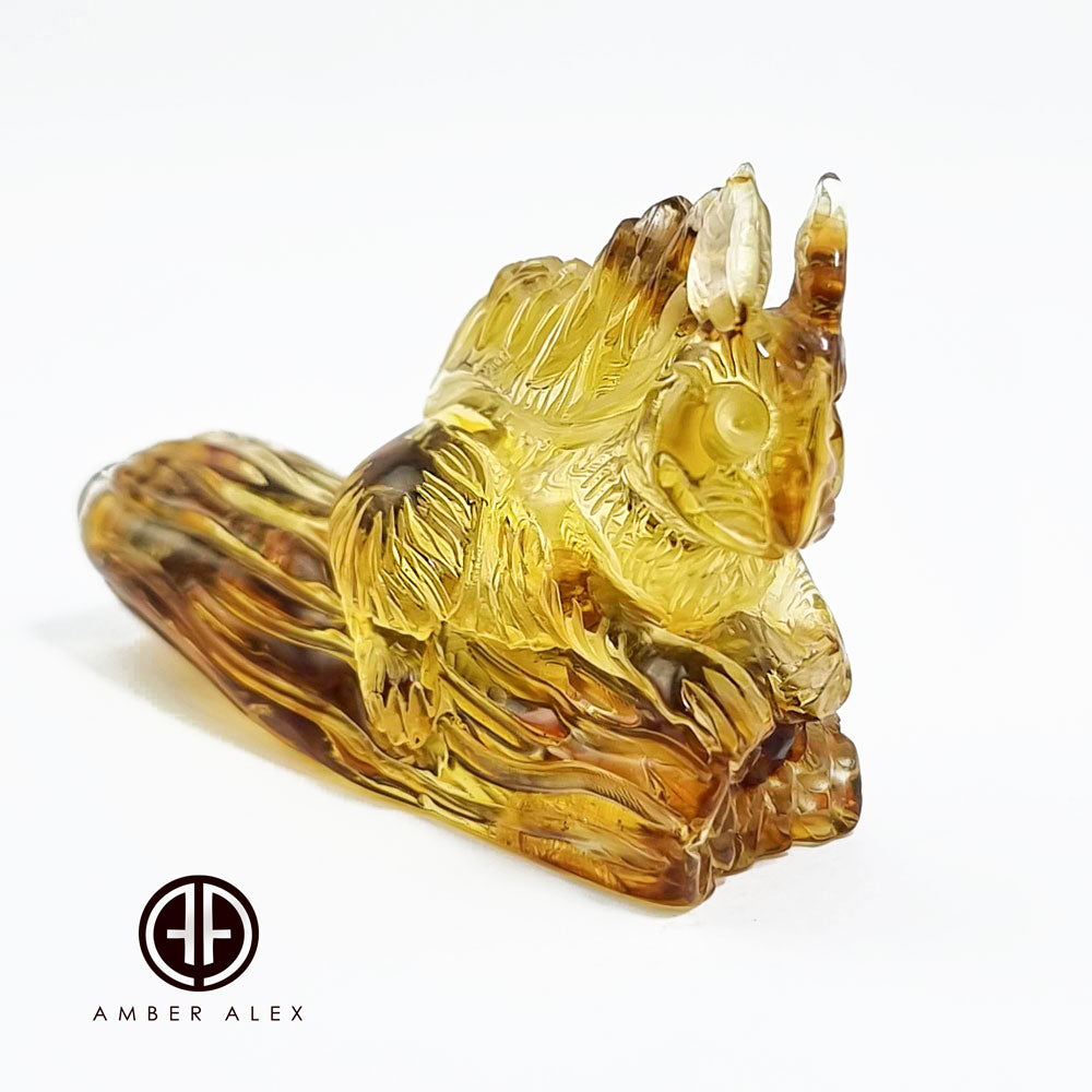 Fossil Amber Carved Squirrel Figurine
