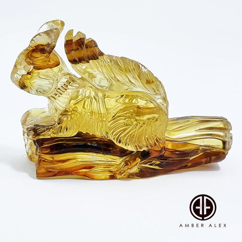 Fossil Amber Carved Squirrel Figurine