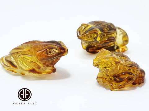 Cognac Amber Carved Frogs Figurines