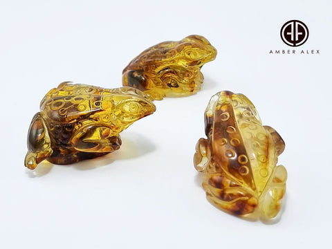 Cognac Amber Carved Frogs Figurines