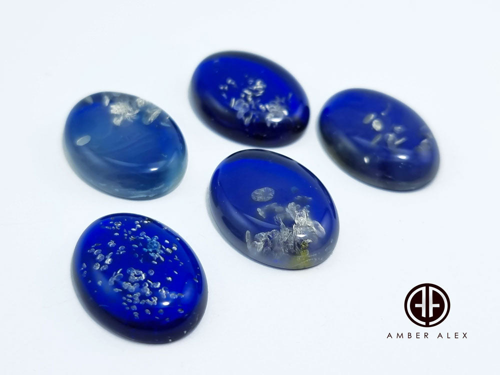 Blue Amber Oval Shape Calibrated Cabochons