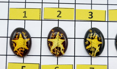 Cherry Amber Engraved Starfish Oval Shape Cabochon