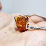 Cognac Amber Carved Rose Charm Bead
