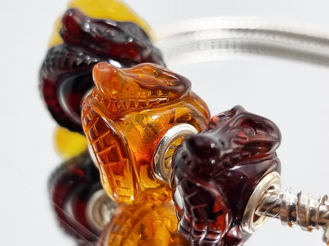 Multi-Color Amber Carved Crocodile Charm Bead