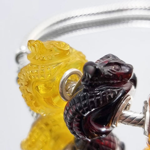 Multi-Color Amber Carved Crocodile Charm Bead