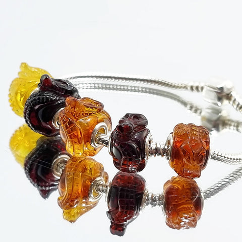 Multi-Color Amber Carved Crocodile Charm Bead