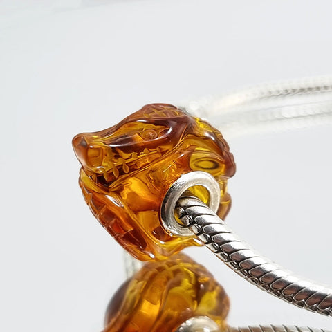 Multi-Color Amber Carved Crocodile Charm Bead