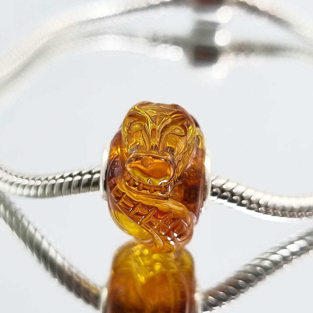 Multi-Color Amber Carved Crocodile Charm Bead