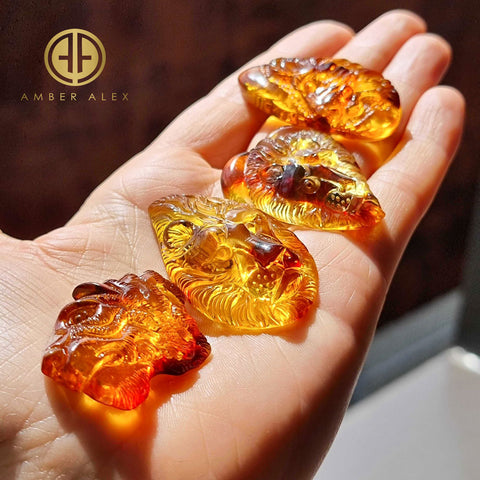 Cognac Amber Carved Lion Cabochon