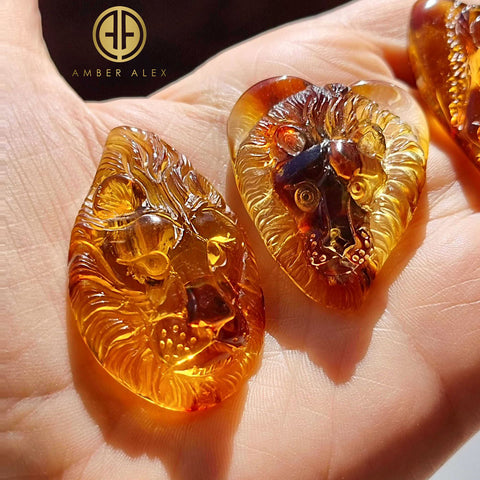 Cognac Amber Carved Lion Cabochon