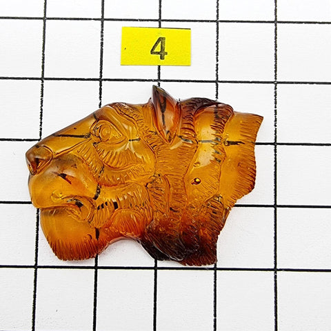 Cognac Amber Carved Lion Cabochon