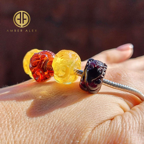 Multi-Color Amber Carved Elephant Charm Bead